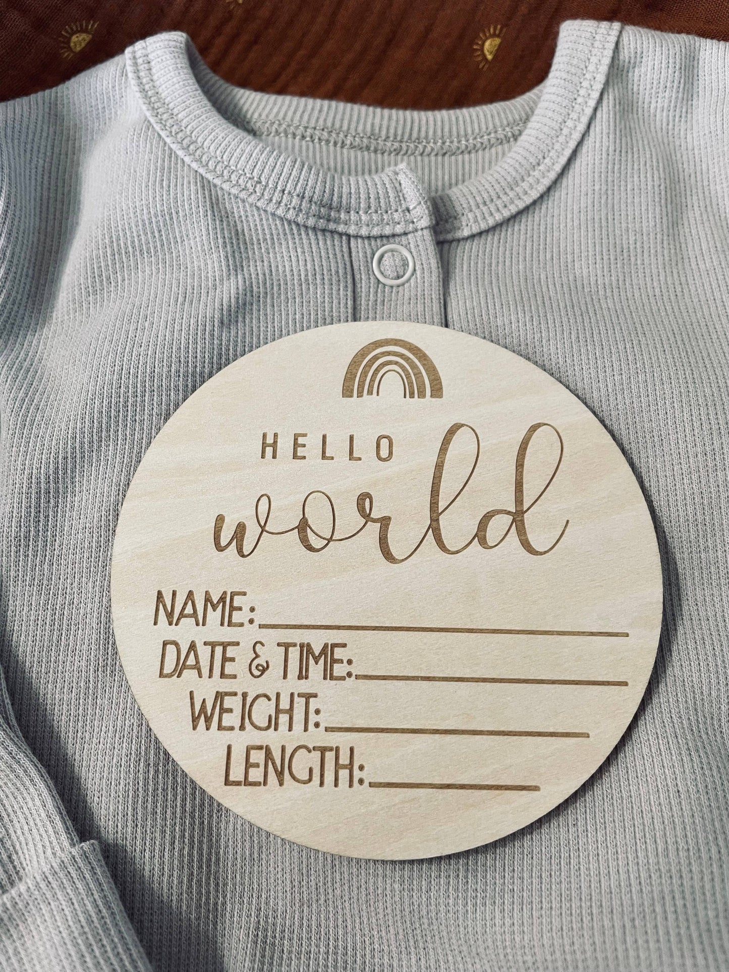 Newborn baby sign for birth announcement with Hello World message, perfect for introducing your child.