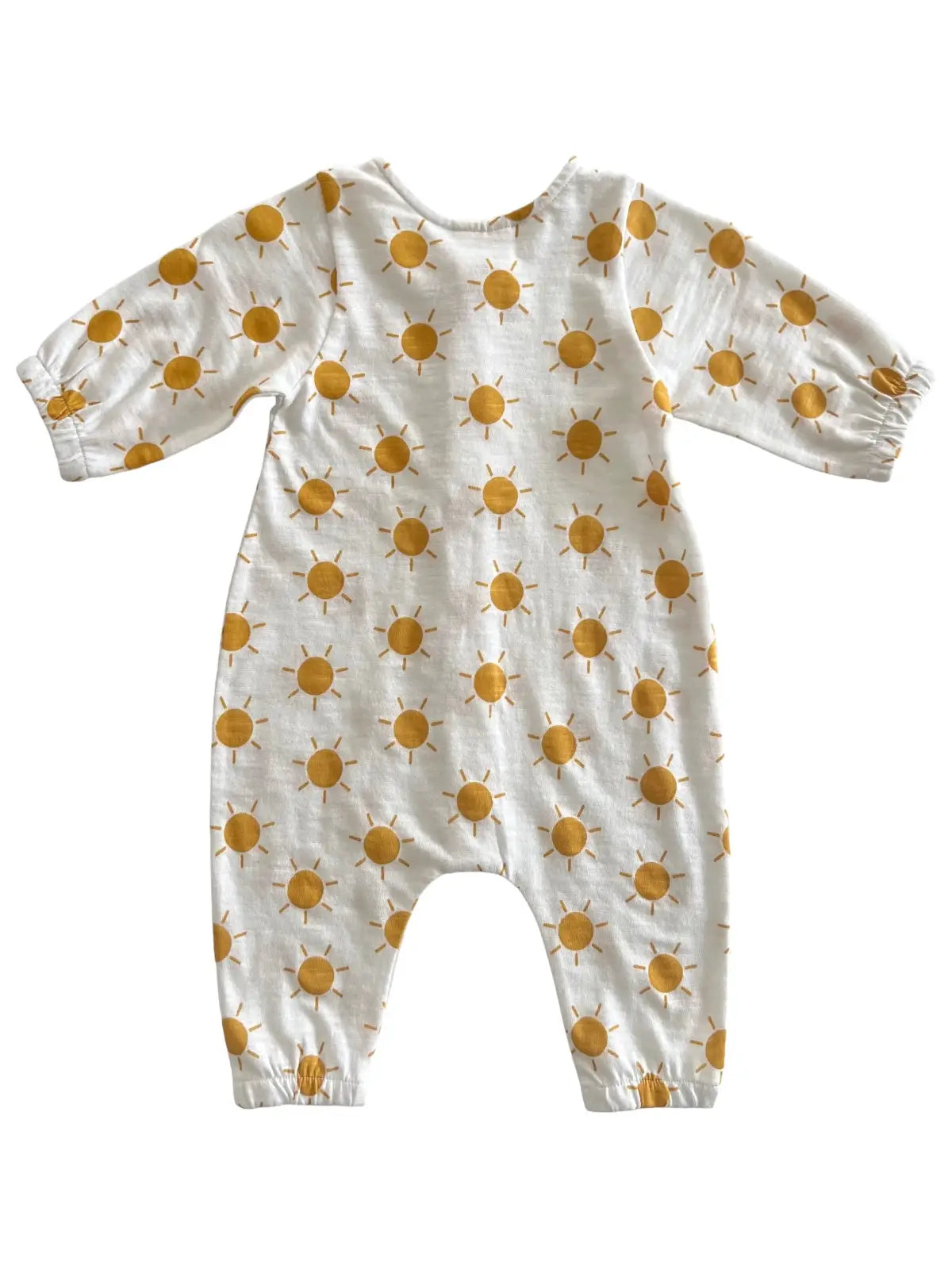back of long sleeve jumpsuit with yellow sun patterns