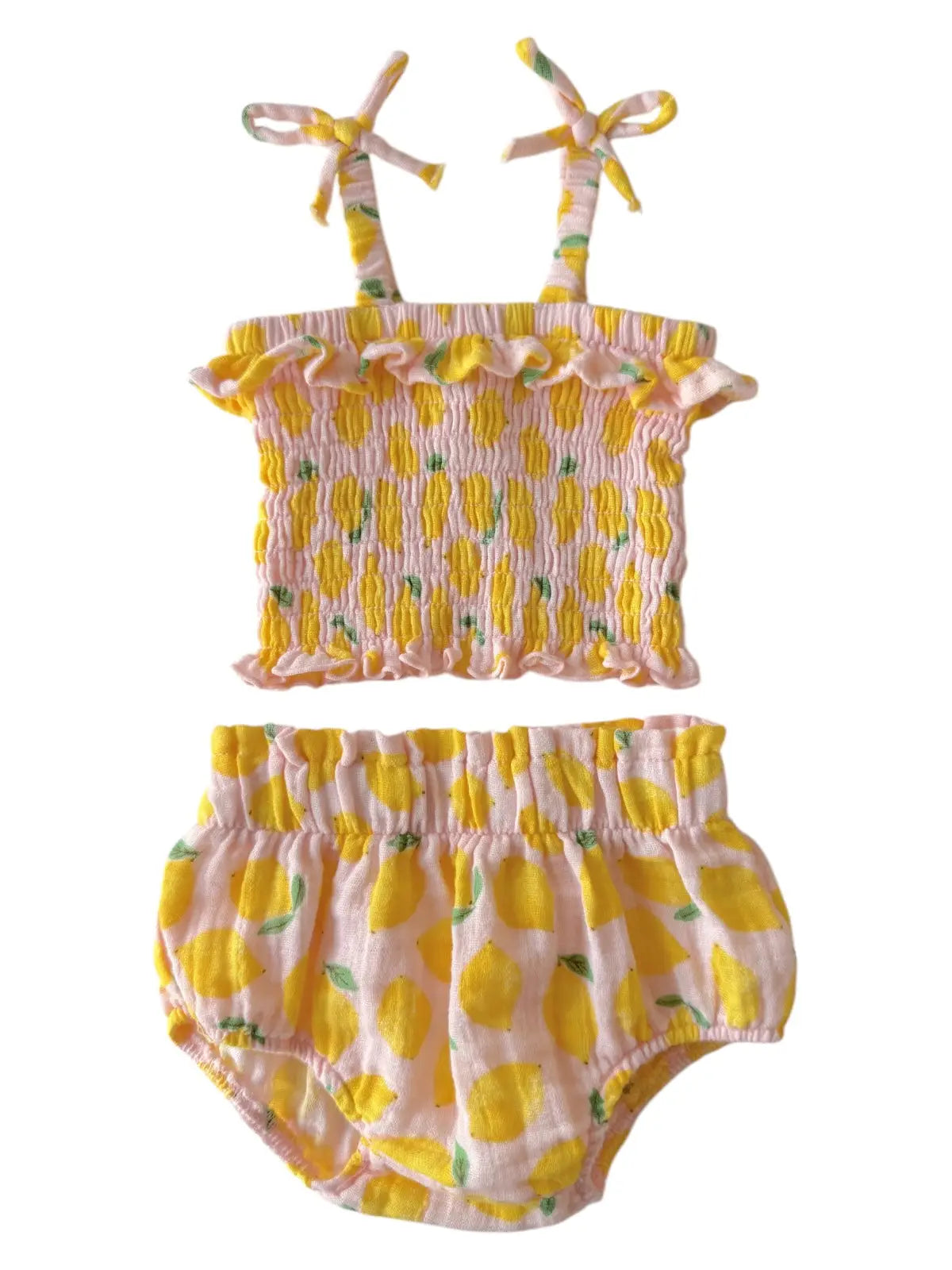 Two-piece swimsuit with lemon pattern on a white background