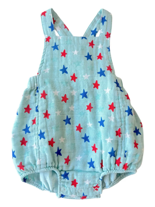 Light blue romper with red, white, and blue star pattern on a white background